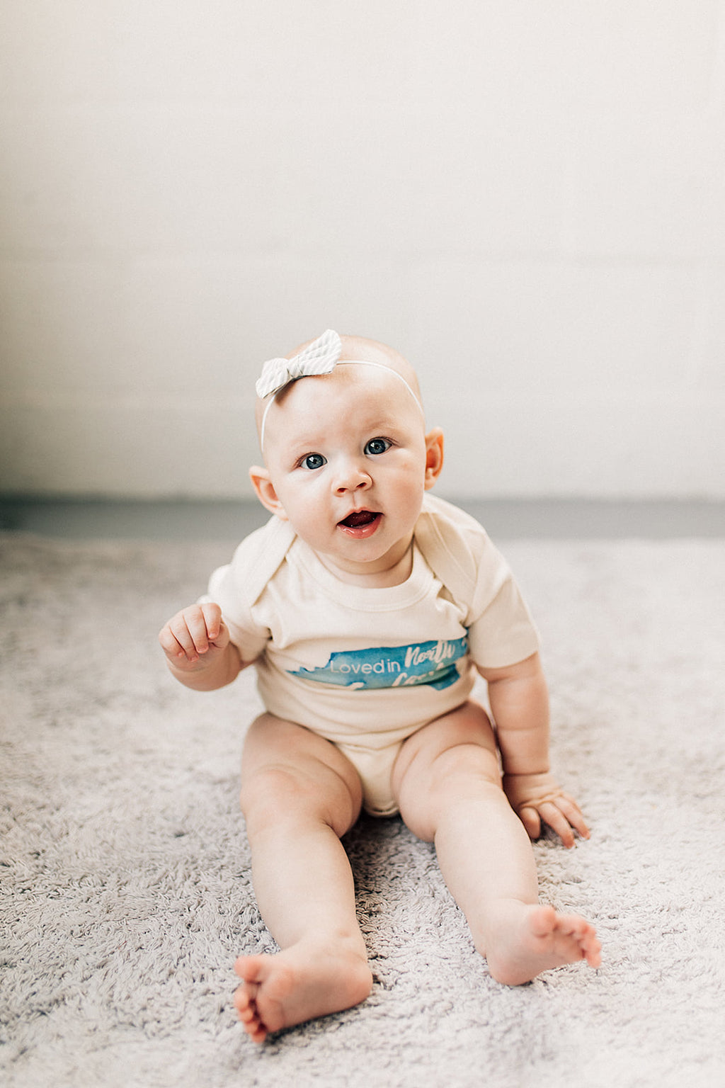 Loved in North Carolina Organic Baby Onesie®