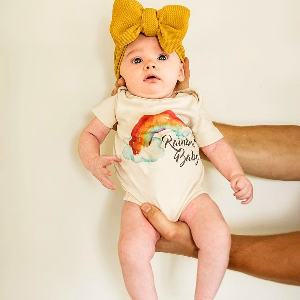 Rainbow Baby Lucky Charm Organic Baby Onesie®