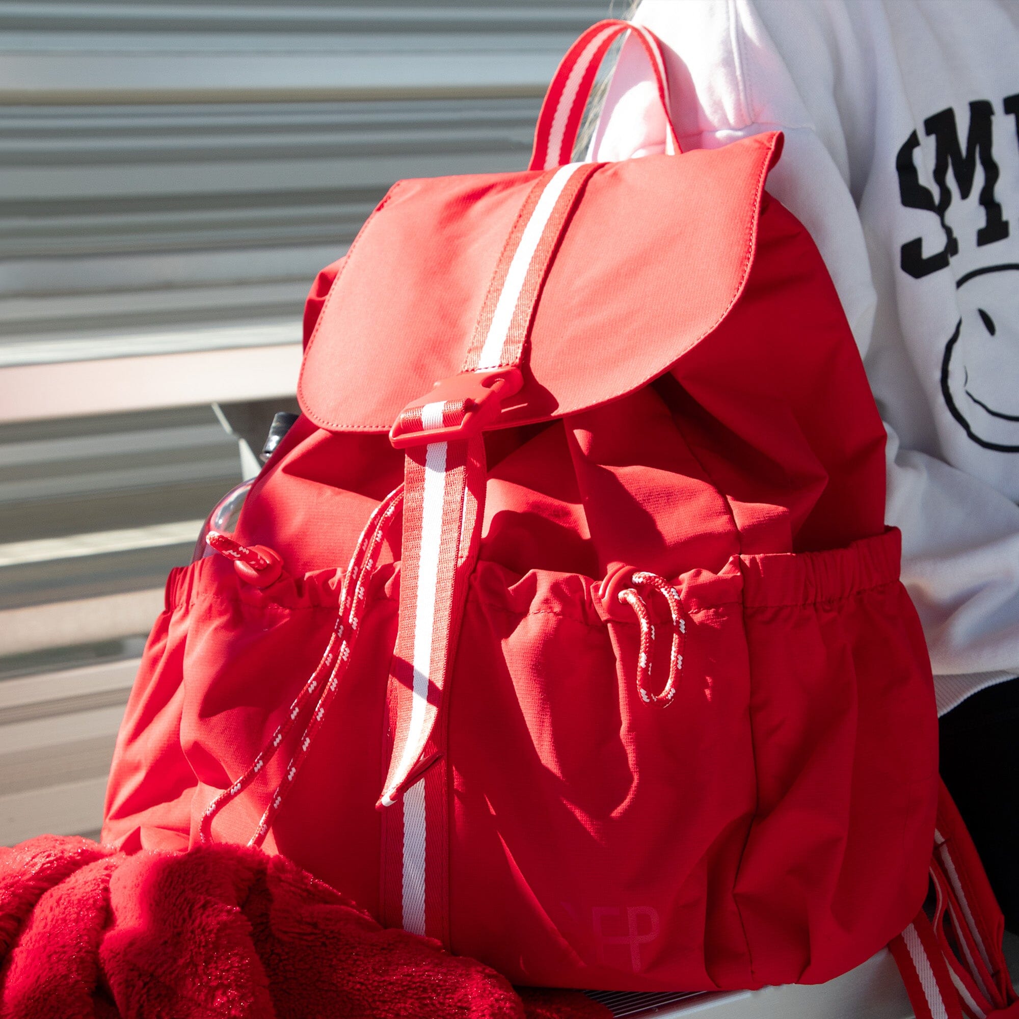 Cherry Motion Drawcord Backpack